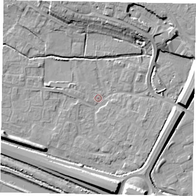 Shaded relief map of the ground around SL12UE, computed from Environment Agency LiDAR. The ground here sits at about 21 m above sea level and falls 12 m across the surrounding 800 m. Surface water reaching this point runs off ground lying to the north-north-east, 10.7 m higher.