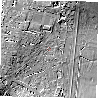 Shaded relief map of the ground around SL41JE, computed from Environment Agency LiDAR. The ground here sits at about 21 m above sea level and falls 12 m across the surrounding 800 m. Surface water reaching this point runs off ground lying to the west, 6.4 m higher.