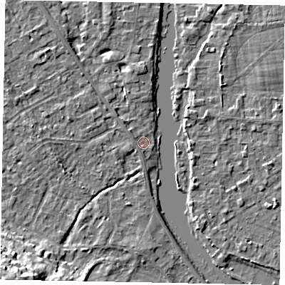 Shaded relief map of the ground around SL42SS, computed from Environment Agency LiDAR. The ground here sits at about 16 m above sea level and falls 19 m across the surrounding 800 m. Surface water reaching this point runs off ground lying to the west, 1.1 m higher.