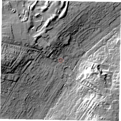 Shaded relief map of the ground around SL58QS, computed from Environment Agency LiDAR. The ground here sits at about 74 m above sea level and falls 25 m across the surrounding 800 m. Surface water reaching this point runs off ground lying to the west, 21.0 m higher.