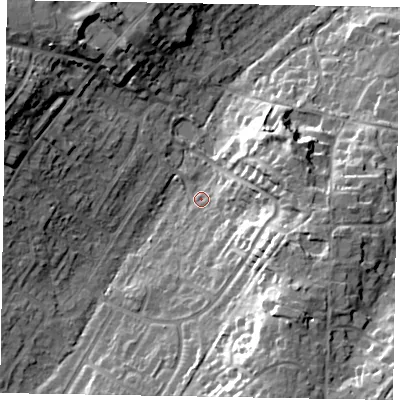 Shaded relief map of the ground around SL58QT, computed from Environment Agency LiDAR. The ground here sits at about 74 m above sea level and falls 22 m across the surrounding 800 m. Surface water reaching this point runs off ground lying to the south-south-east, 18.2 m higher.
