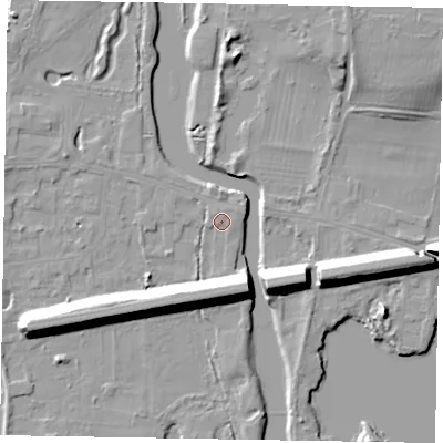 Shaded relief map of the ground around SL60AP, computed from Environment Agency LiDAR. The ground here sits at about 24 m above sea level and falls 13 m across the surrounding 800 m. Surface water reaching this point runs off ground lying to the south-west, 11.0 m higher.
