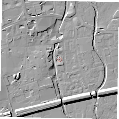 Shaded relief map of the ground around SL61QP, computed from Environment Agency LiDAR. The ground here sits at about 23 m above sea level and falls 16 m across the surrounding 800 m. Surface water reaching this point runs off ground lying to the south, 2.6 m higher.