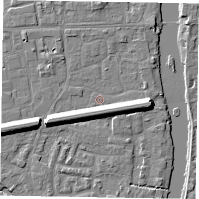 Shaded relief map of the ground around SL61XH, computed from Environment Agency LiDAR. The ground here sits at about 23 m above sea level and falls 13 m across the surrounding 800 m. Surface water reaching this point runs off ground lying to the south-east, 11.0 m higher.