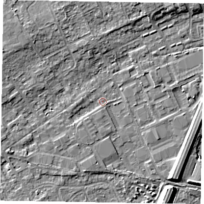 Shaded relief map of the ground around SL71PF, computed from Environment Agency LiDAR. The ground here sits at about 27 m above sea level and falls 8 m across the surrounding 800 m. Surface water reaching this point runs off ground lying to the south-east, 6.9 m higher.