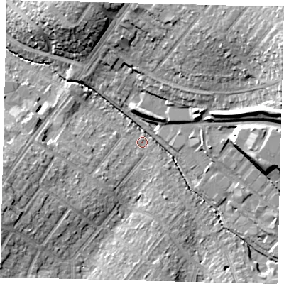 Shaded relief map of the ground around SM39DT, computed from Environment Agency LiDAR. The ground here sits at about 23 m above sea level and falls 24 m across the surrounding 800 m. Surface water reaching this point runs off ground lying to the east-north-east, 18.2 m higher.