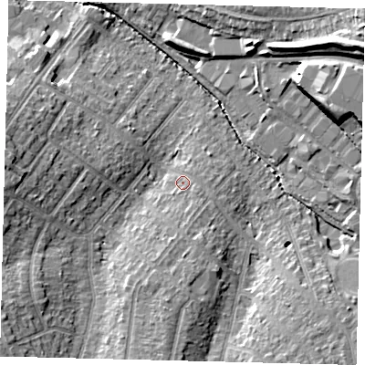 Shaded relief map of the ground around SM39RA, computed from Environment Agency LiDAR. The ground here sits at about 25 m above sea level and falls 21 m across the surrounding 800 m. Surface water reaching this point runs off ground lying to the south, 2.4 m higher.