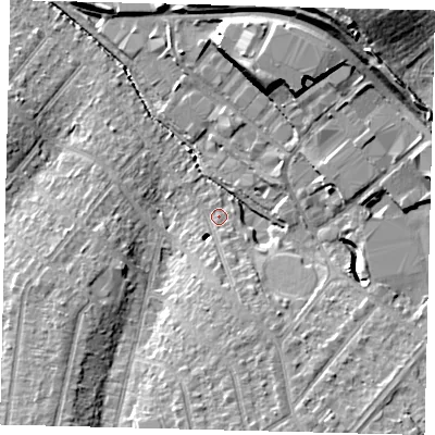 Shaded relief map of the ground around SM39RL, computed from Environment Agency LiDAR. The ground here sits at about 25 m above sea level and falls 22 m across the surrounding 800 m. Surface water reaching this point runs off ground lying to the south, 4.6 m higher.