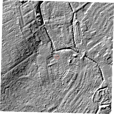 Shaded relief map of the ground around SM52HE, computed from Environment Agency LiDAR. The ground here sits at about 25 m above sea level and falls 9 m across the surrounding 800 m. Surface water reaching this point runs off ground lying to the south-west, 5.4 m higher.