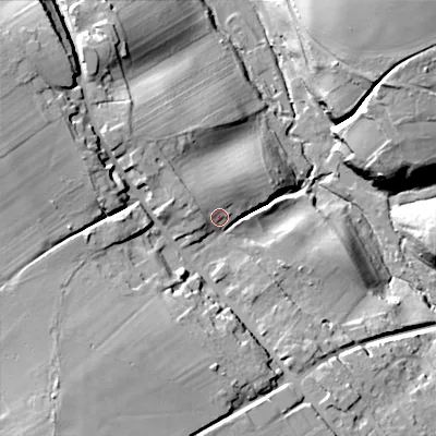 Shaded relief map of the ground around SN104ET, computed from Environment Agency LiDAR. The ground here sits at about 85 m above sea level and falls 34 m across the surrounding 800 m. Surface water reaching this point runs off ground lying to the west-north-west, 6.0 m higher.