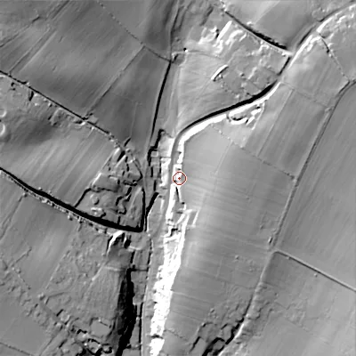 Shaded relief map of the ground around SN104PG, computed from Environment Agency LiDAR. The ground here sits at about 102 m above sea level and falls 30 m across the surrounding 800 m. Surface water reaching this point runs off ground lying to the east-north-east, 18.5 m higher.