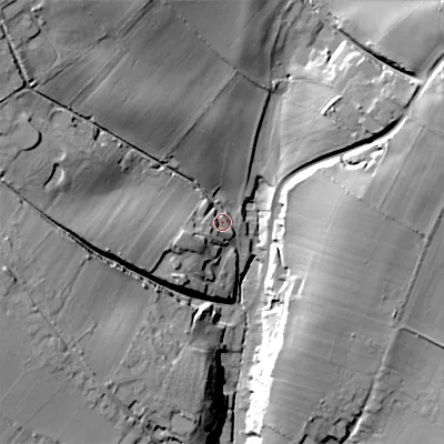 Shaded relief map of the ground around SN104PS, computed from Environment Agency LiDAR. The ground here sits at about 100 m above sea level and falls 33 m across the surrounding 800 m. Surface water reaching this point runs off ground lying to the west-south-west, 10.4 m higher.