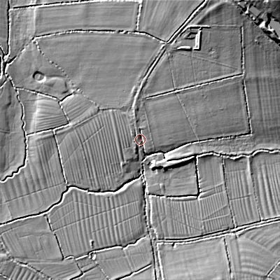 Shaded relief map of the ground around SN105TE, computed from Environment Agency LiDAR. The ground here sits at about 60 m above sea level and falls 25 m across the surrounding 800 m. Surface water reaching this point runs off ground lying to the north, 2.3 m higher.
