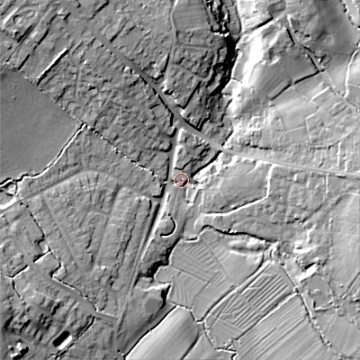 Shaded relief map of the ground around SN110QX, computed from Environment Agency LiDAR. The ground here sits at about 76 m above sea level and falls 18 m across the surrounding 800 m. Surface water reaching this point runs off ground lying to the south-west, 16.7 m higher.
