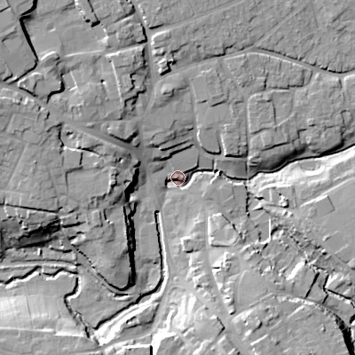 Shaded relief map of the ground around SN110RD, computed from Environment Agency LiDAR. The ground here sits at about 69 m above sea level and falls 20 m across the surrounding 800 m. Surface water reaching this point runs off ground lying to the south-south-east, 15.2 m higher.