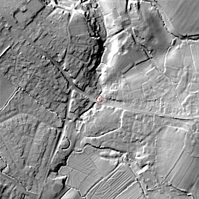 Shaded relief map of the ground around SN118JT, computed from Environment Agency LiDAR. The ground here sits at about 75 m above sea level and falls 18 m across the surrounding 800 m. Surface water reaching this point runs off ground lying to the north-west, 15.6 m higher.