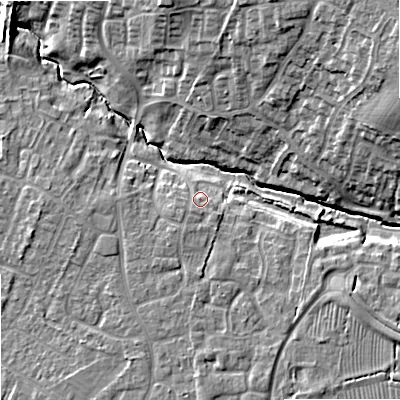 Shaded relief map of the ground around SN127LS, computed from Environment Agency LiDAR. The ground here sits at about 38 m above sea level and falls 14 m across the surrounding 800 m. Surface water reaching this point runs off ground lying to the south, 3.0 m higher.