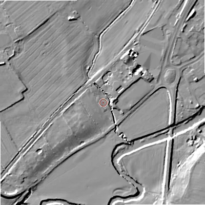 Shaded relief map of the ground around SN128LQ, computed from Environment Agency LiDAR. The ground here sits at about 34 m above sea level and falls 10 m across the surrounding 800 m. Surface water reaching this point runs off ground lying to the west, 1.2 m higher.