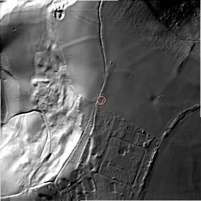 Shaded relief map of the ground around SN130PF, computed from Environment Agency LiDAR. The ground here sits at about 133 m above sea level and falls 105 m across the surrounding 800 m. Surface water reaching this point runs off ground lying to the south-east, 5.0 m higher.