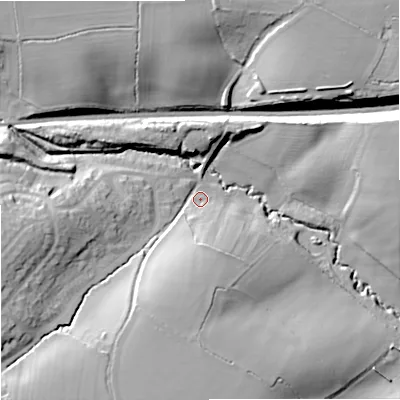 Shaded relief map of the ground around SN139PF, computed from Environment Agency LiDAR. The ground here sits at about 69 m above sea level and falls 25 m across the surrounding 800 m. Surface water reaching this point runs off ground lying to the south-west, 19.4 m higher.