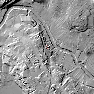 Shaded relief map of the ground around SN153JW, computed from Environment Agency LiDAR. The ground here sits at about 50 m above sea level and falls 22 m across the surrounding 800 m. Surface water reaching this point runs off ground lying to the south-west, 9.4 m higher.