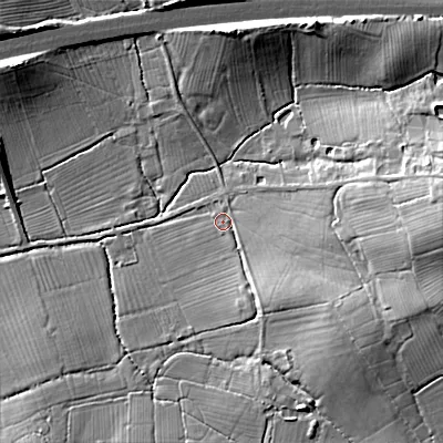 Shaded relief map of the ground around SN154JP, computed from Environment Agency LiDAR. The ground here sits at about 69 m above sea level and falls 17 m across the surrounding 800 m. Surface water reaching this point runs off ground lying to the south-east, 6.4 m higher.