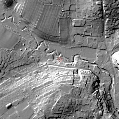 Shaded relief map of the ground around SN160DZ, computed from Environment Agency LiDAR. The ground here sits at about 73 m above sea level and falls 22 m across the surrounding 800 m. Surface water reaching this point runs off ground lying to the south, 17.2 m higher.