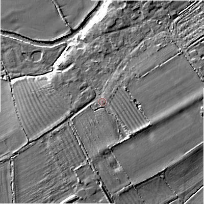 Shaded relief map of the ground around SN66JX, computed from Environment Agency LiDAR. The ground here sits at about 79 m above sea level and falls 8 m across the surrounding 800 m. Surface water reaching this point runs off ground lying to the south-east, 2.5 m higher.