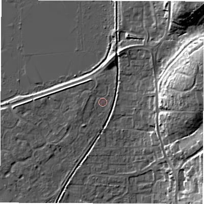 Shaded relief map of the ground around SO510GX, computed from Environment Agency LiDAR. The ground here sits at about 18 m above sea level and falls 22 m across the surrounding 800 m. Surface water reaching this point runs off ground lying to the west, 1.6 m higher.