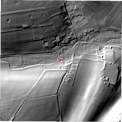 Shaded relief map of the ground around SP110JL, computed from Environment Agency LiDAR. The ground here sits at about 115 m above sea level and falls 33 m across the surrounding 800 m. Surface water reaching this point runs off ground lying to the south-south-west, 24.8 m higher.