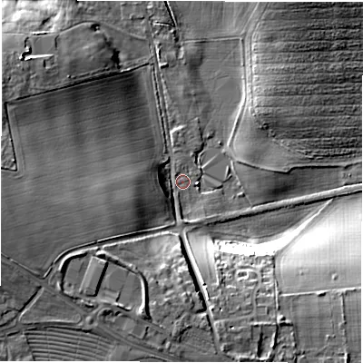 Shaded relief map of the ground around SP110QB, computed from Environment Agency LiDAR. The ground here sits at about 77 m above sea level and falls 24 m across the surrounding 800 m. Surface water reaching this point runs off ground lying to the west-south-west, 23.0 m higher.