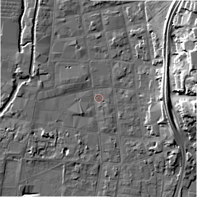 Shaded relief map of the ground around SP12DF, computed from Environment Agency LiDAR. The ground here sits at about 46 m above sea level and falls 25 m across the surrounding 800 m. Surface water reaching this point runs off ground lying to the north-east, 21.9 m higher.