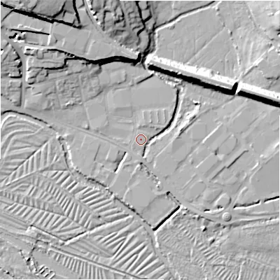 Shaded relief map of the ground around SP12LB, computed from Environment Agency LiDAR. The ground here sits at about 45 m above sea level and falls 22 m across the surrounding 800 m. Surface water reaching this point runs off ground lying to the east, 2.0 m higher.