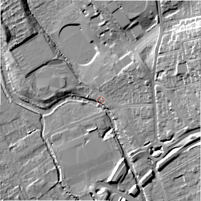 Shaded relief map of the ground around SP13NA, computed from Environment Agency LiDAR. The ground here sits at about 50 m above sea level and falls 23 m across the surrounding 800 m. Surface water reaching this point runs off ground lying to the east-north-east, 22.8 m higher.