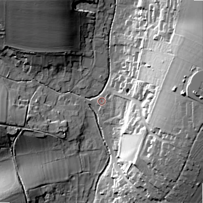 Shaded relief map of the ground around SP34BT, computed from Environment Agency LiDAR. The ground here sits at about 79 m above sea level and falls 35 m across the surrounding 800 m. Surface water reaching this point runs off ground lying to the east, 12.4 m higher.