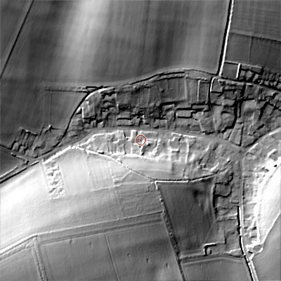 Shaded relief map of the ground around SP34RY, computed from Environment Agency LiDAR. The ground here sits at about 100 m above sea level and falls 25 m across the surrounding 800 m. Surface water reaching this point runs off ground lying to the south-south-west, 13.1 m higher.