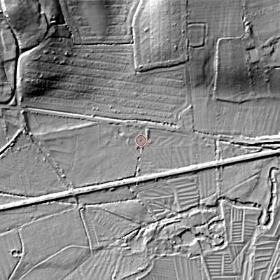Shaded relief map of the ground around SP35EQ, computed from Environment Agency LiDAR. The ground here sits at about 70 m above sea level and falls 25 m across the surrounding 800 m. Surface water reaching this point runs off ground lying to the north-west, 1.2 m higher.