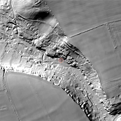 Shaded relief map of the ground around SP35JT, computed from Environment Agency LiDAR. The ground here sits at about 84 m above sea level and falls 59 m across the surrounding 800 m. Surface water reaching this point runs off ground lying to the north-east, 56.8 m higher.