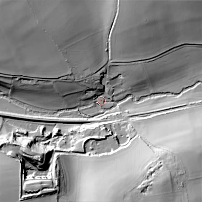 Shaded relief map of the ground around SP36LY, computed from Environment Agency LiDAR. The ground here sits at about 86 m above sea level and falls 43 m across the surrounding 800 m. Surface water reaching this point runs off ground lying to the north-west, 38.7 m higher.