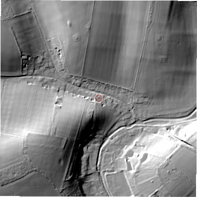 Shaded relief map of the ground around SP40HQ, computed from Environment Agency LiDAR. The ground here sits at about 85 m above sea level and falls 29 m across the surrounding 800 m. Surface water reaching this point runs off ground lying to the south-west, 25.7 m higher.