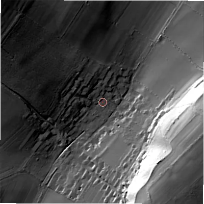 Shaded relief map of the ground around SP51DL, computed from Environment Agency LiDAR. The ground here sits at about 77 m above sea level and falls 51 m across the surrounding 800 m. Surface water reaching this point runs off ground lying to the north-west, 33.0 m higher.