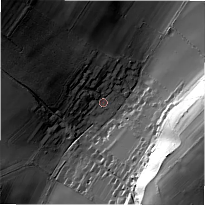 Shaded relief map of the ground around SP51DP, computed from Environment Agency LiDAR. The ground here sits at about 77 m above sea level and falls 50 m across the surrounding 800 m. Surface water reaching this point runs off ground lying to the north-west, 36.7 m higher.