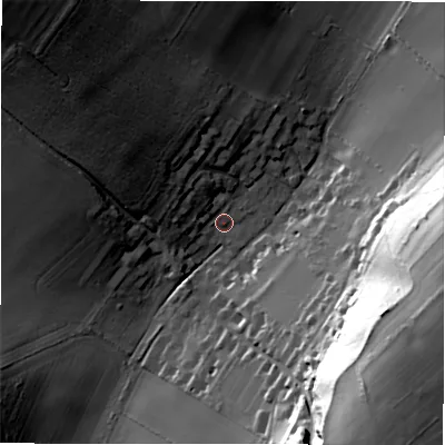 Shaded relief map of the ground around SP51ER, computed from Environment Agency LiDAR. The ground here sits at about 77 m above sea level and falls 51 m across the surrounding 800 m. Surface water reaching this point runs off ground lying to the north-west, 15.0 m higher.