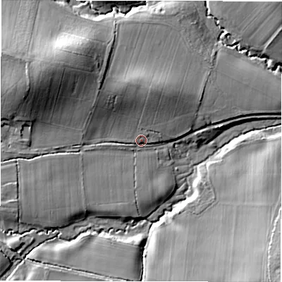 Shaded relief map of the ground around SP52DT, computed from Environment Agency LiDAR. The ground here sits at about 34 m above sea level and falls 18 m across the surrounding 800 m. Surface water reaching this point runs off ground lying to the north-west, 13.6 m higher.