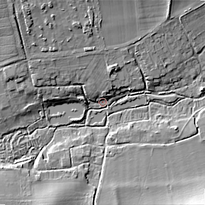 Shaded relief map of the ground around SP54DB, computed from Environment Agency LiDAR. The ground here sits at about 71 m above sea level and falls 15 m across the surrounding 800 m. Surface water reaching this point runs off ground lying to the north-north-west, 6.6 m higher.