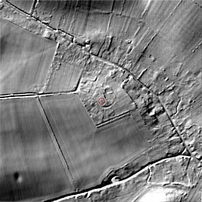 Shaded relief map of the ground around SP63LP, computed from Environment Agency LiDAR. The ground here sits at about 70 m above sea level and falls 16 m across the surrounding 800 m. Surface water reaching this point runs off ground lying to the west, 0.8 m higher.