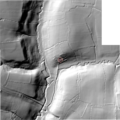 Shaded relief map of the ground around SP70JX, computed from Environment Agency LiDAR. The ground here sits at about 73 m above sea level and falls 40 m across the surrounding 800 m. Surface water reaching this point runs off ground lying to the north-north-east, 9.7 m higher.