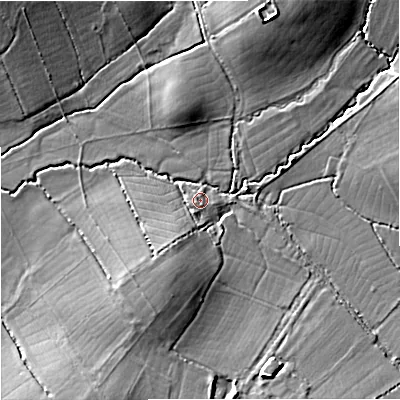 Shaded relief map of the ground around SP70QA, computed from Environment Agency LiDAR. The ground here sits at about 57 m above sea level and falls 8 m across the surrounding 800 m. Surface water reaching this point runs off ground lying to the south-west, 1.2 m higher.