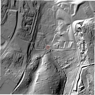 Shaded relief map of the ground around SR33DT, computed from Environment Agency LiDAR. The ground here sits at about 69 m above sea level and falls 43 m across the surrounding 800 m. Surface water reaching this point runs off ground lying to the south-east, 36.2 m higher.