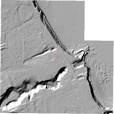Shaded relief map of the ground around SR77AA, computed from Environment Agency LiDAR. The ground here sits at about 21 m above sea level and falls 38 m across the surrounding 800 m. Surface water reaching this point runs off ground lying to the south-west, 4.3 m higher.